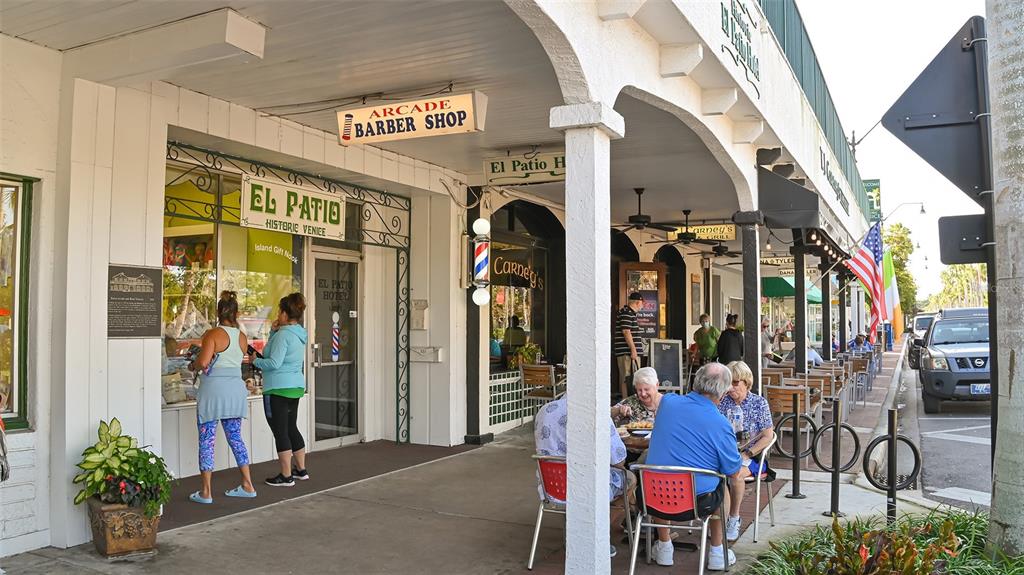 449 Redwood Road Venice, FL 34293 - Photo 32 of 40 a view of path along with retail shop and outdoor seating