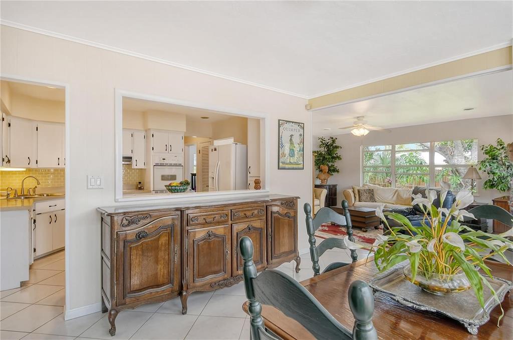 449 Redwood Road Venice, FL 34293 - Photo 10 of 40 a spacious bathroom with a sink a mirror and a bathtub