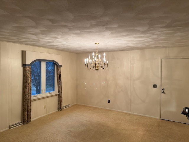 3307 North View Road Rockford, IL 61107 - Photo 6 of 19 a view of a hallway with windows and chandelier
