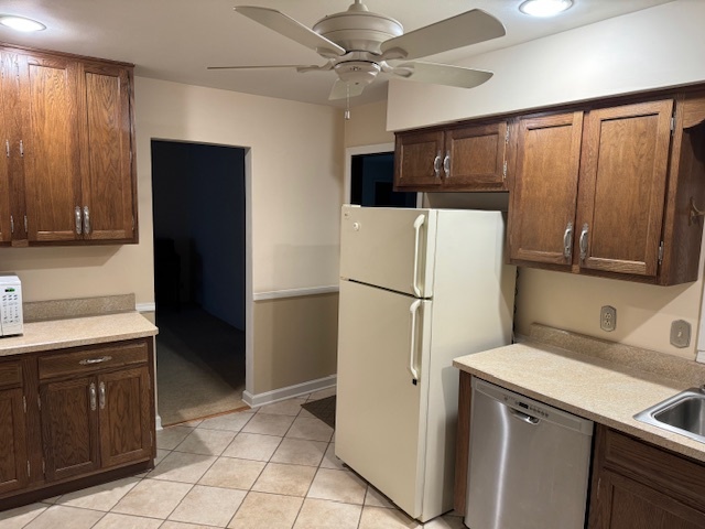 3307 North View Road Rockford, IL 61107 - Photo 7 of 19 a white refrigerator freezer and a stove in a kitchen