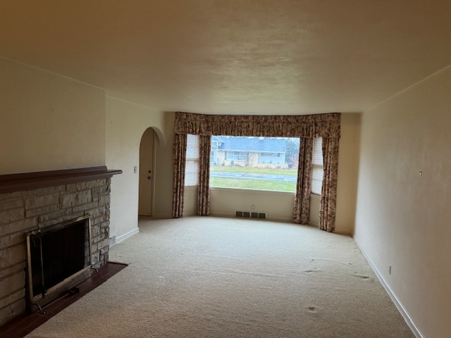 3307 North View Road Rockford, IL 61107 - Photo 9 of 19 a view of empty room with a fireplace