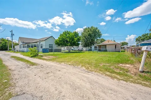 a view of a house with a swimming pool