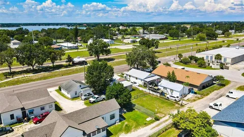 an aerial view of a house with a garden