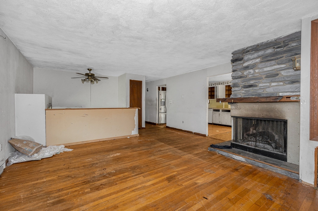 19 Porter Street Billerica, MA 01821 - Photo 13 of 23 a view of a livingroom with a fireplace