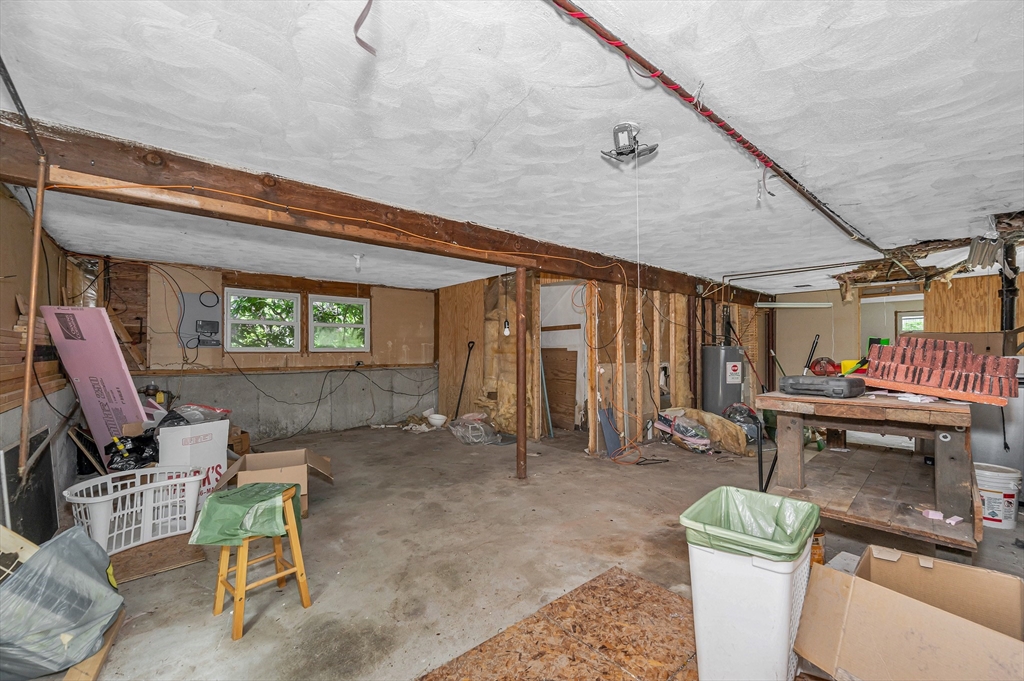 19 Porter Street Billerica, MA 01821 - Photo 23 of 23 a living room with furniture and a wooden floor