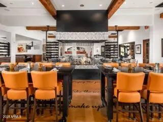 a kitchen with a table and chairs