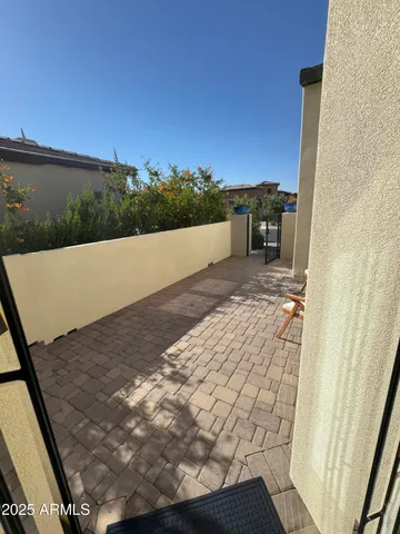 a view of balcony with furniture