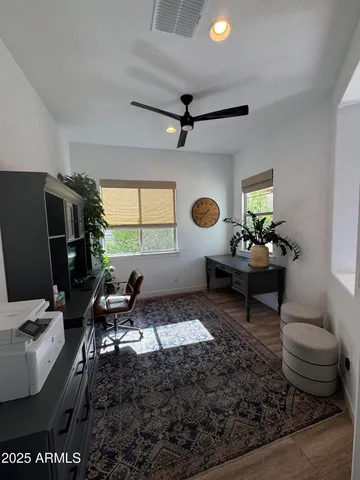 a living room with furniture and a window