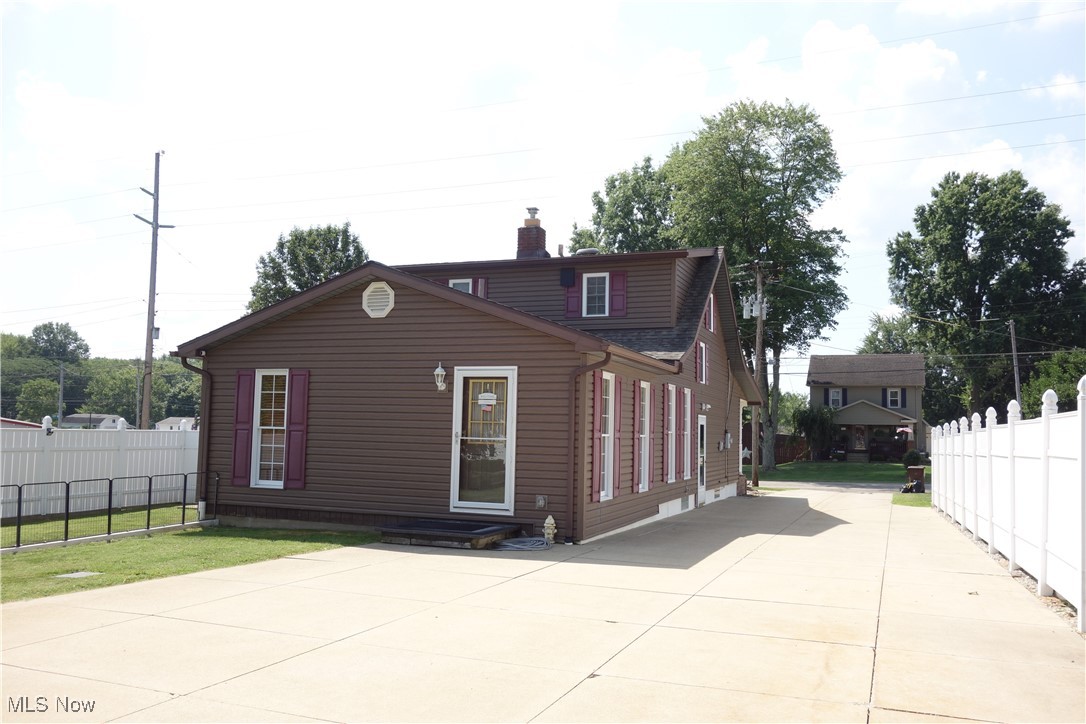 955 Center Road Clinton, OH 44216 - Photo 36 of 40 SO much Driveway & a Great big Yard