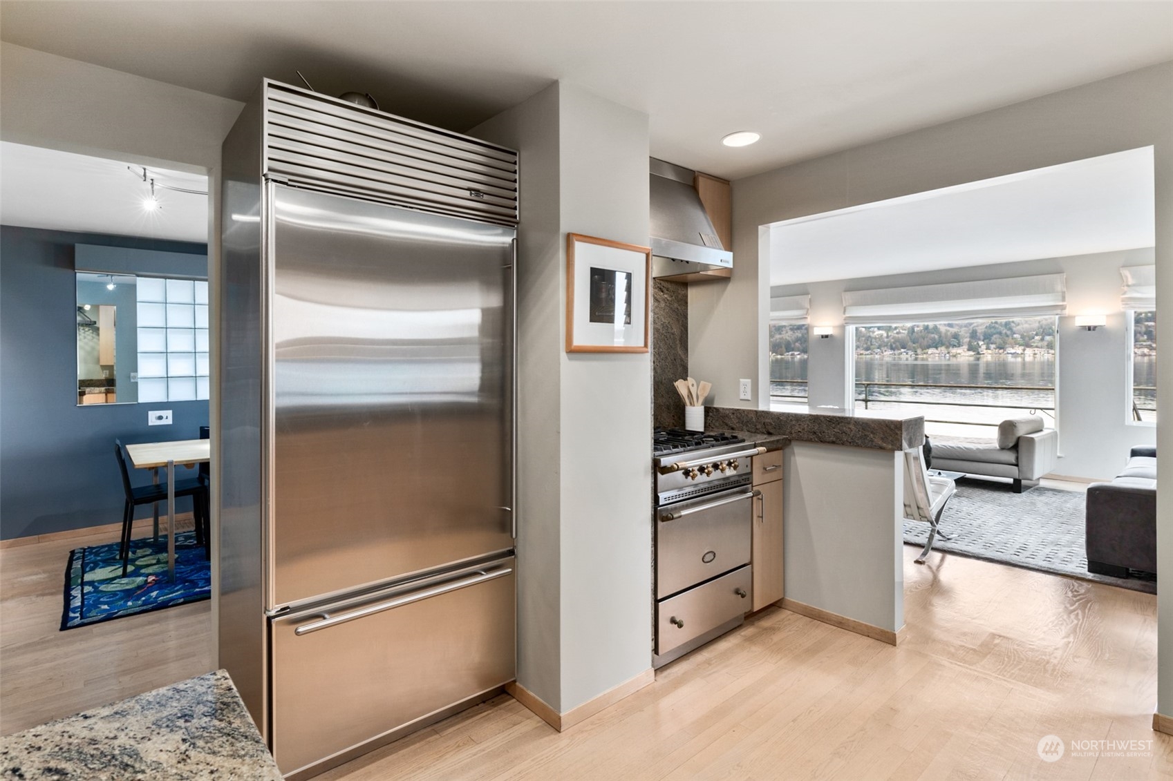11730 Riviera Place Northeast Seattle, WA 98125 - Photo 12 of 34 a kitchen with stainless steel appliances granite countertop a refrigerator and a stove