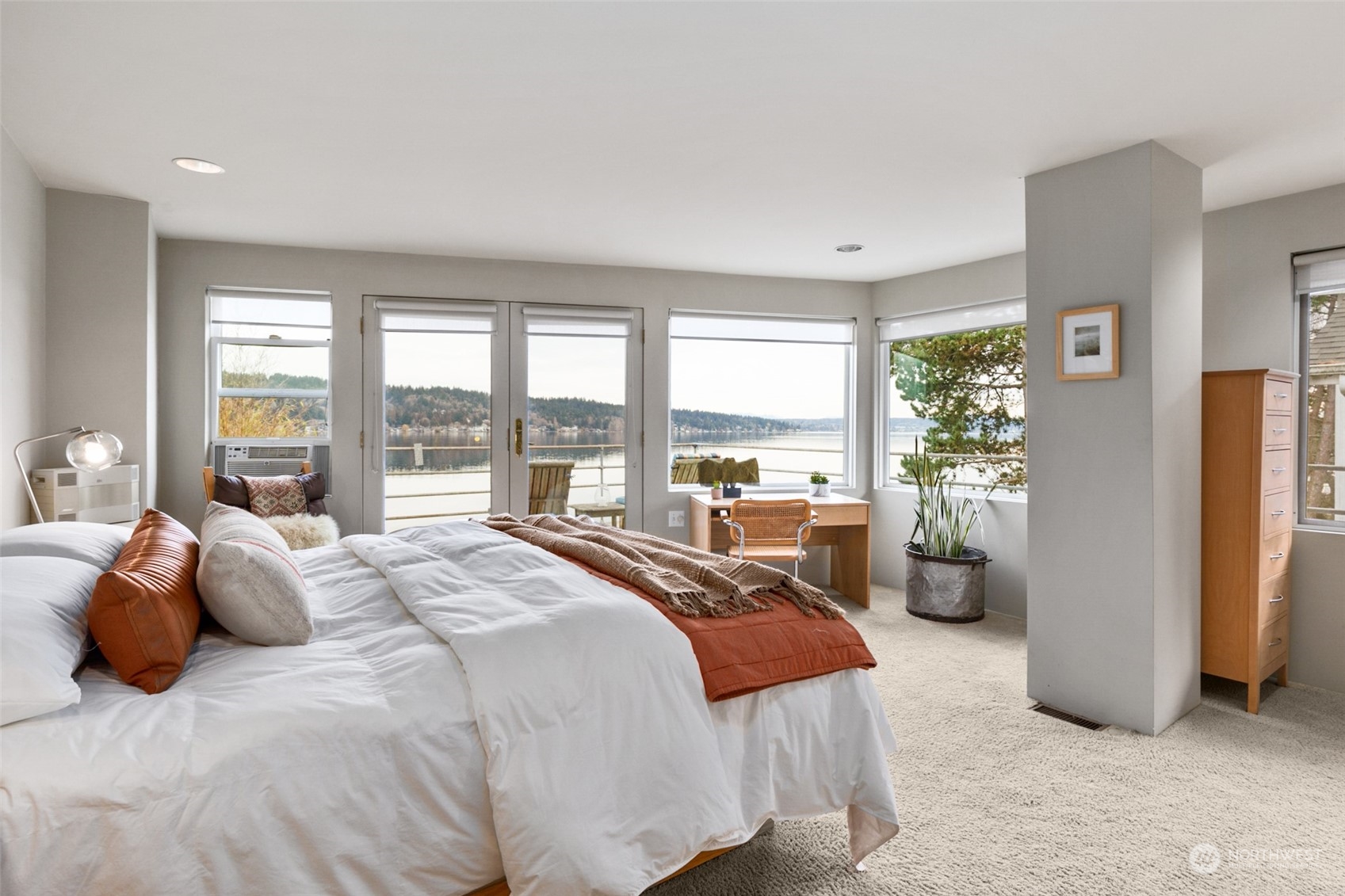 11730 Riviera Place Northeast Seattle, WA 98125 - Photo 14 of 34 a large bedroom with a bed and large window