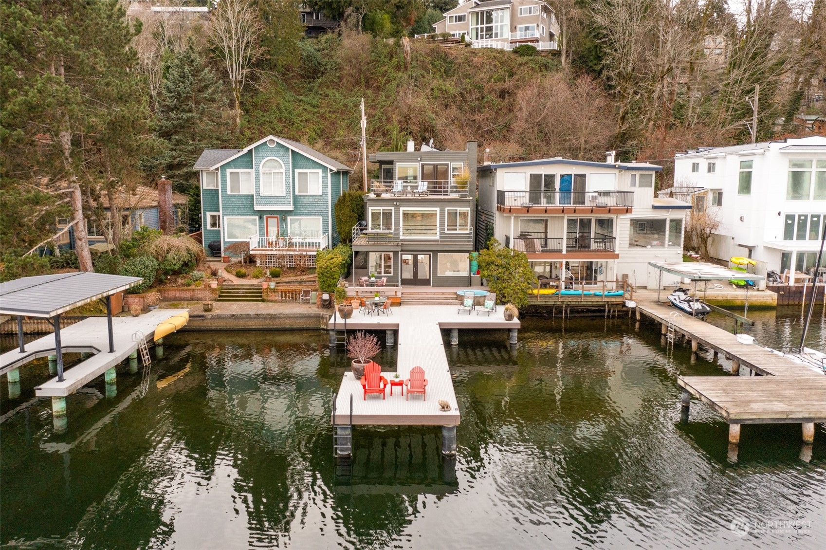 11730 Riviera Place Northeast Seattle, WA 98125 - Photo 31 of 34 a view of a lake with a house and a yard
