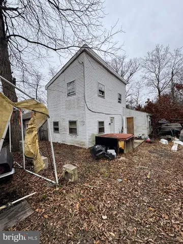 a house view with a backyard
