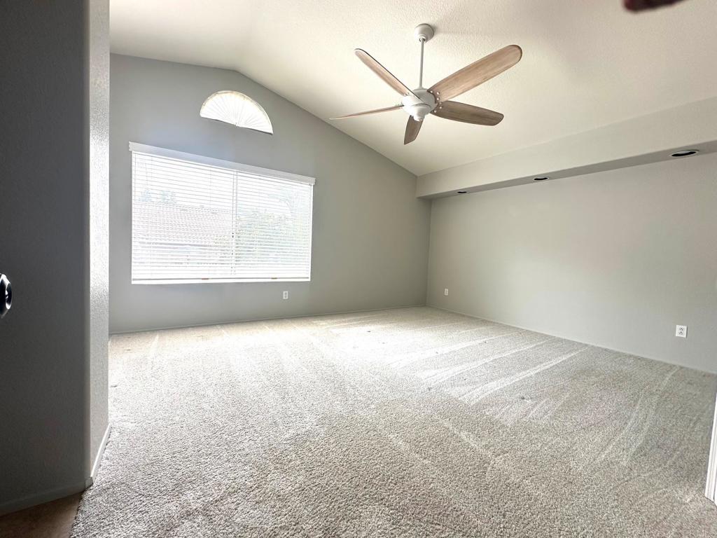 652 Montage Road Oceanside, CA 92057 - Photo 7 of 15 en empty room with windows and fan