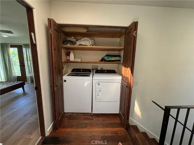 a utility room with washer and dryer
