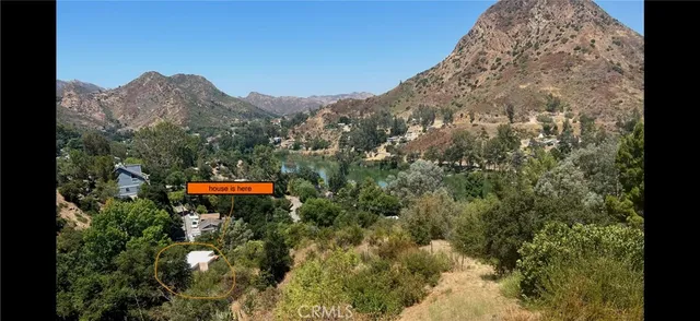 a view of a houses with a yard