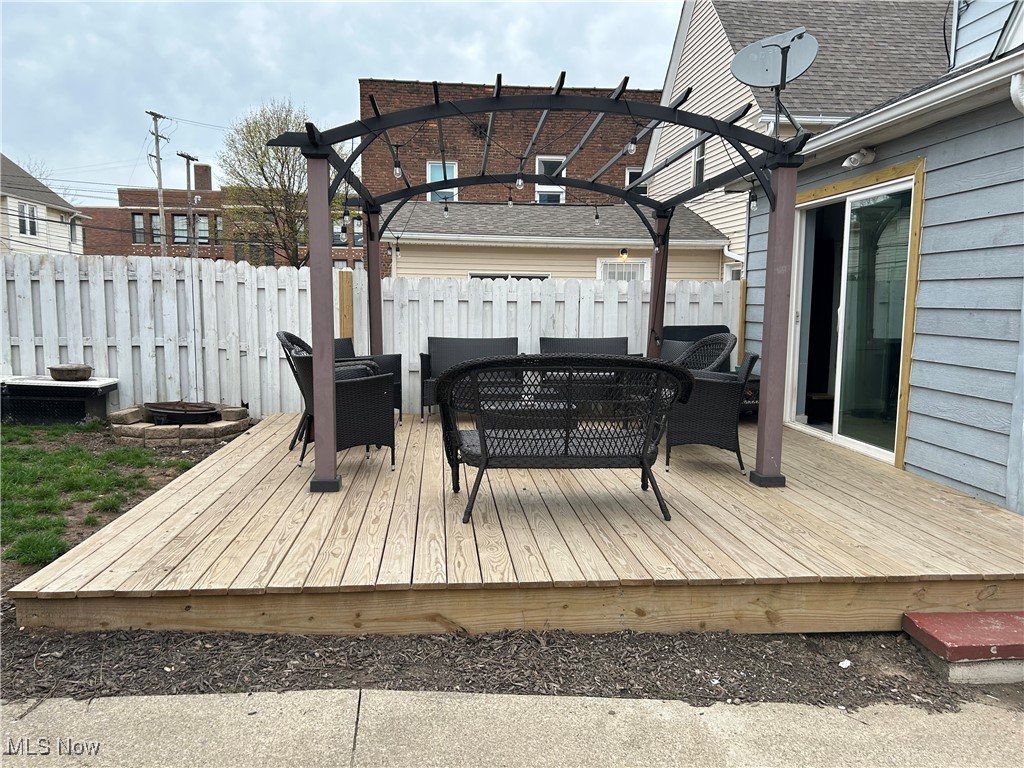 4450 State Road Cleveland, OH 44109 - Photo 15 of 15 Fenced in newly constructed deck to enjoy the privacy of the backyard.