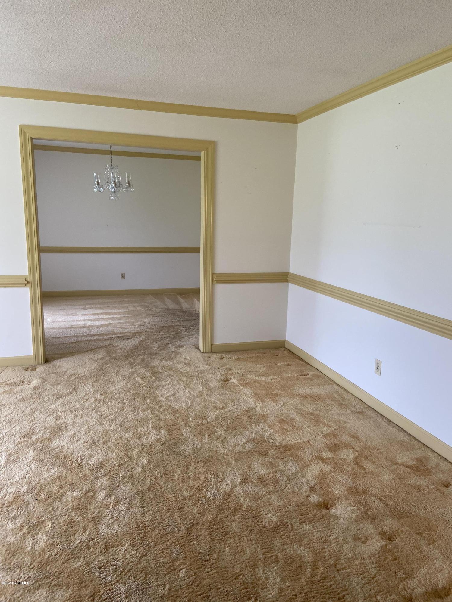 118 Richardson Road New Bern, NC 28562 - Photo 13 of 25 Formal Living Room looking into the formal Dining Room