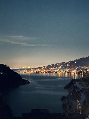 a view of lake and mountain