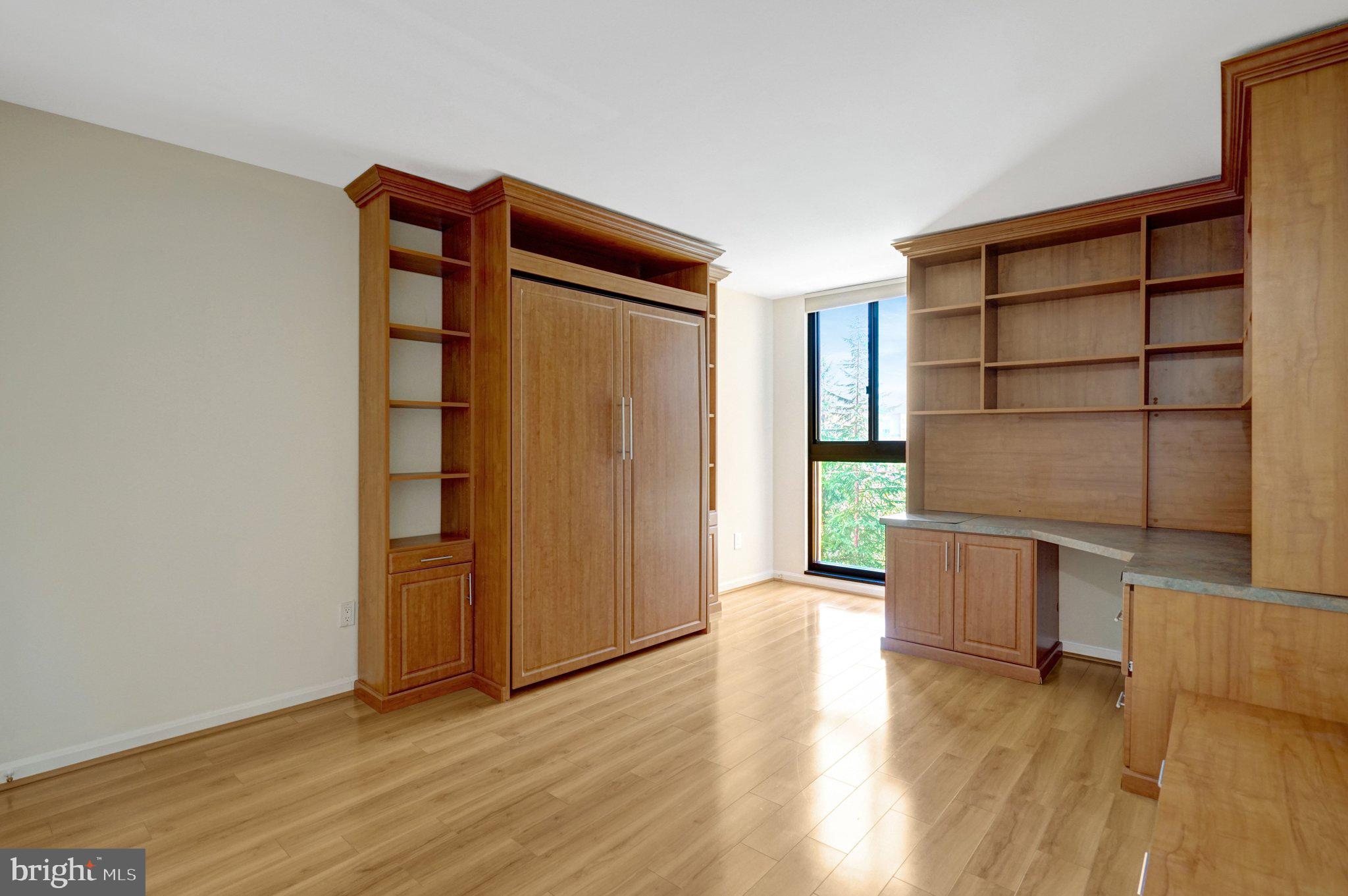 1101 South Arlington Ridge Road, Unit 304 Arlington, VA 22202 - Photo 35 of 60 SEcond bedroom with Murphy Bed.