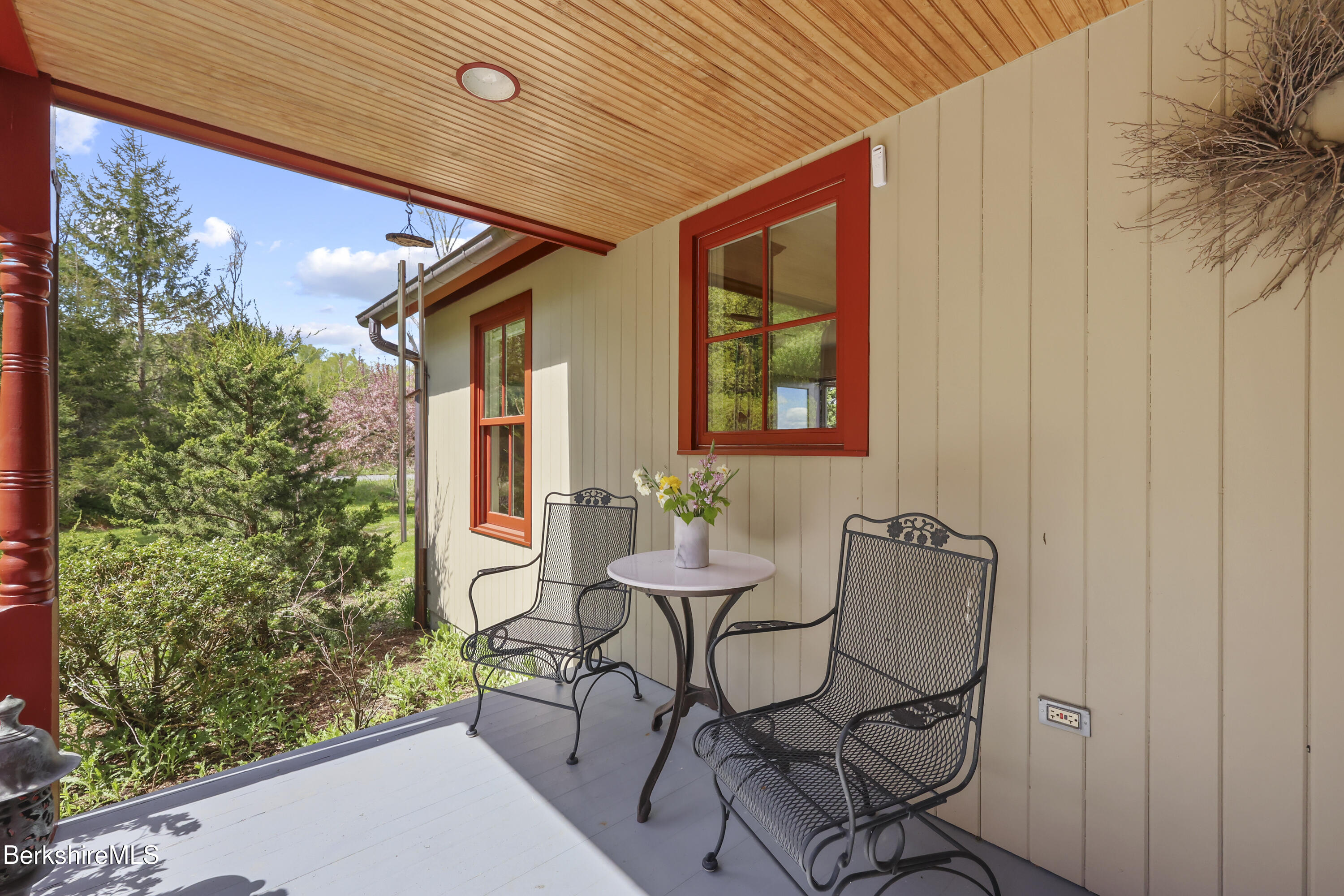 821 Pattison Road North Adams, MA 01247 - Photo 8 of 68 a patio with table and chairs and potted plants