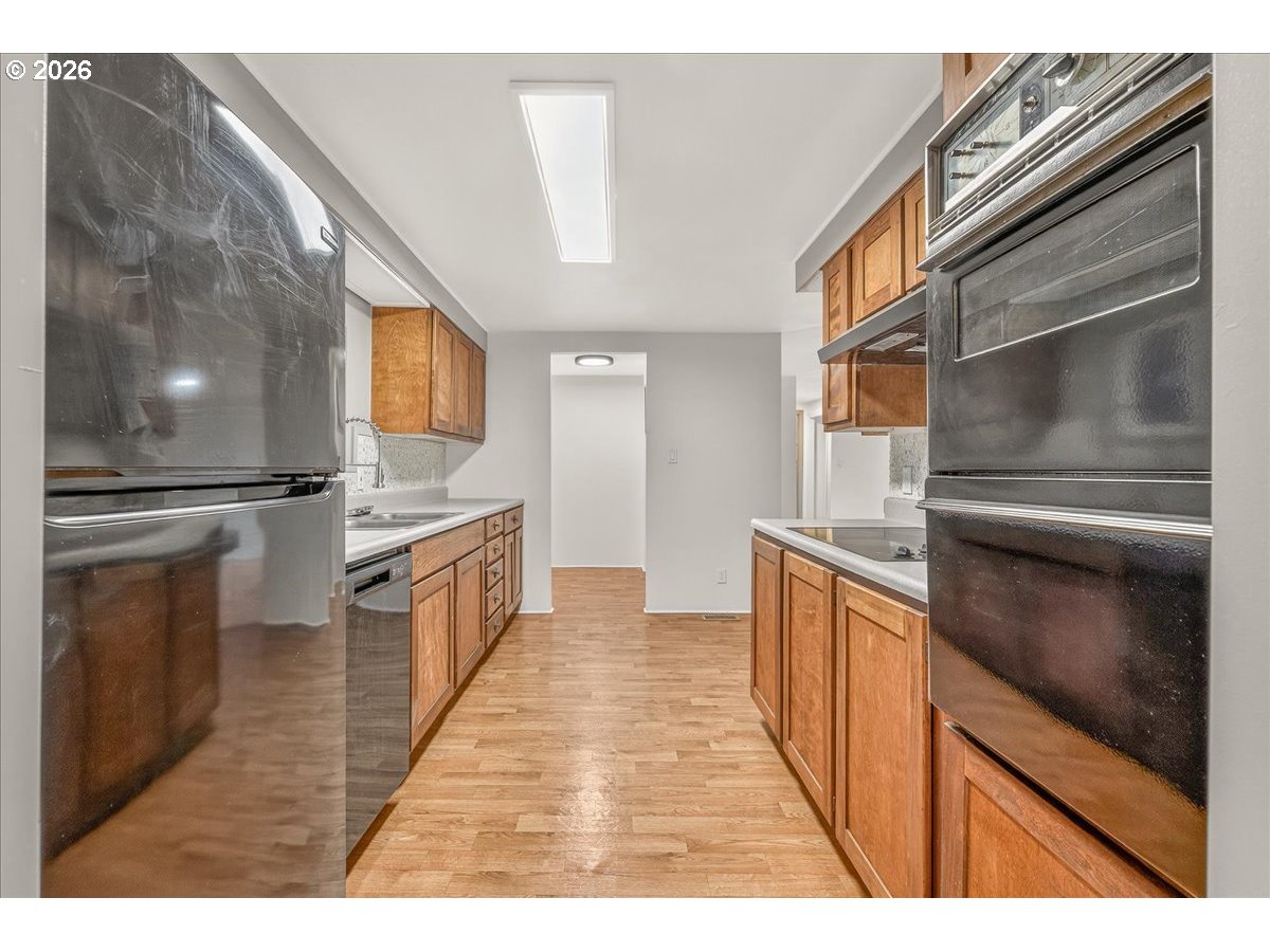 32231 Bishop Road Rainier, OR 97048 - Photo 20 of 26 a view of a kitchen from the hallway