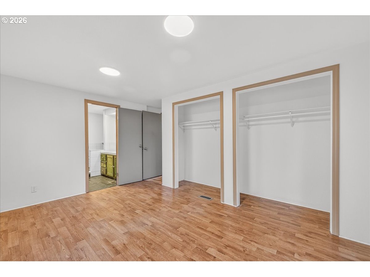 32231 Bishop Road Rainier, OR 97048 - Photo 21 of 26 a view of an empty room with wooden floor