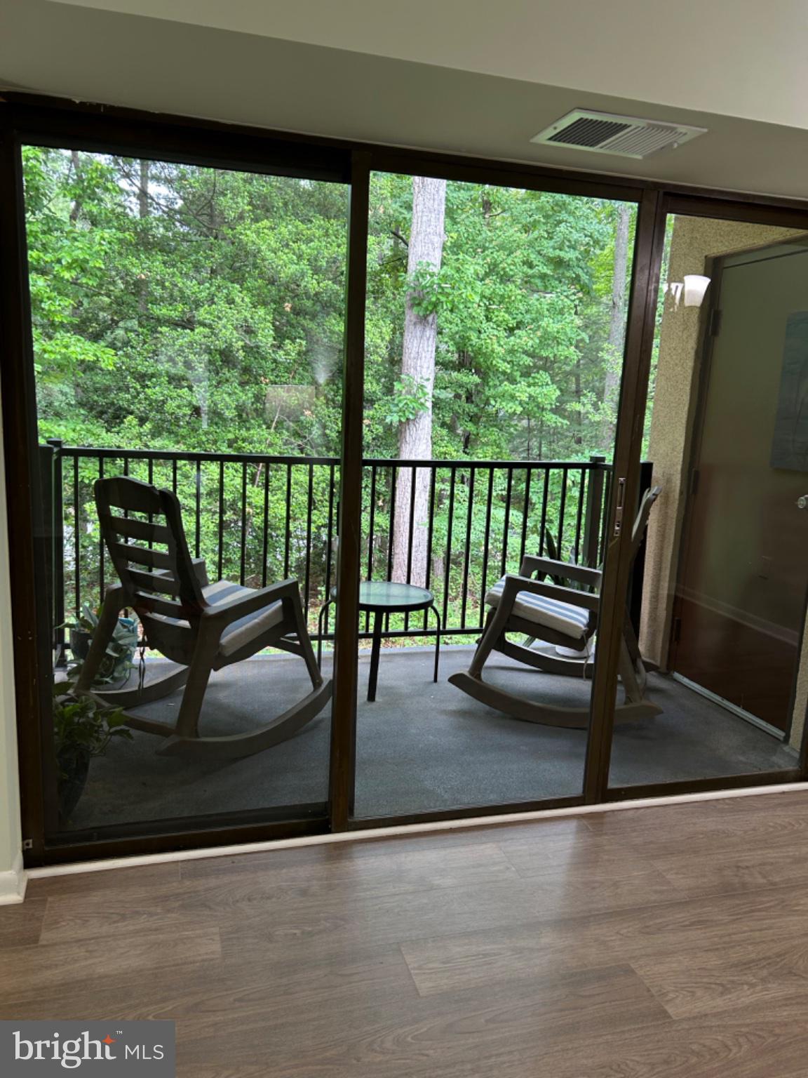 11609 Stoneview Square, Unit 11C Reston, VA 20191 - Photo 29 of 30 Serene balcony with lush green views.