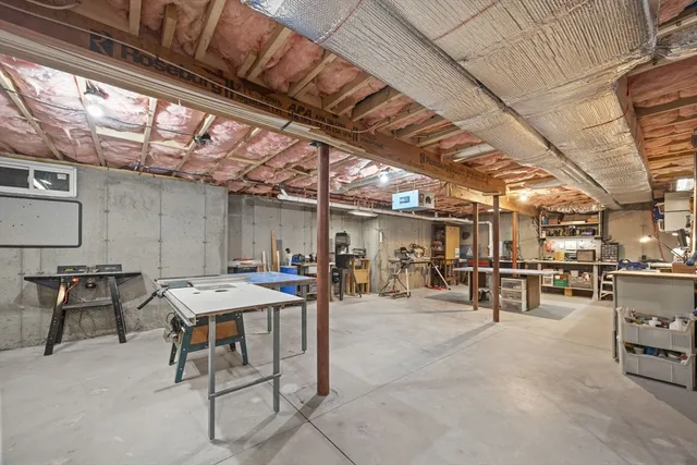 a view of a dinning table and chairs in the room