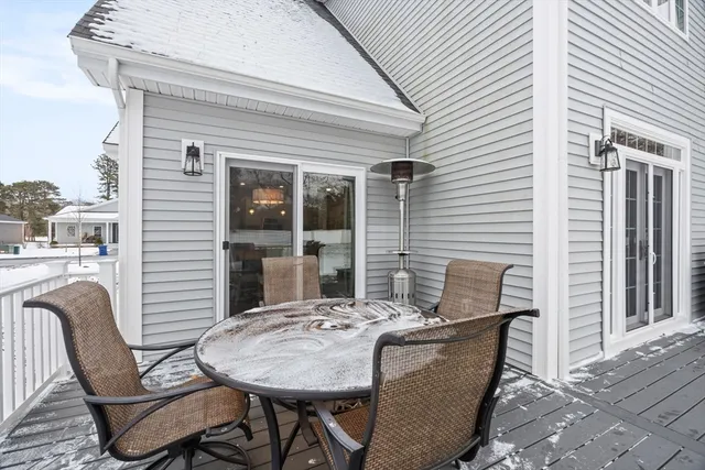 a view of a patio with furniture