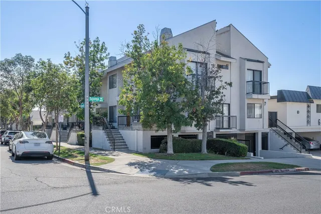 a view of a building with a street