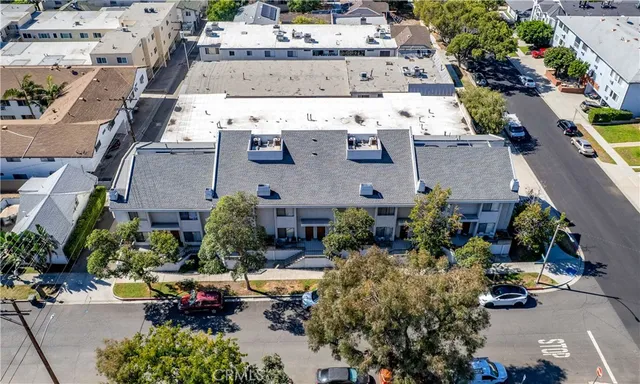 an aerial view of a houses with outdoor space