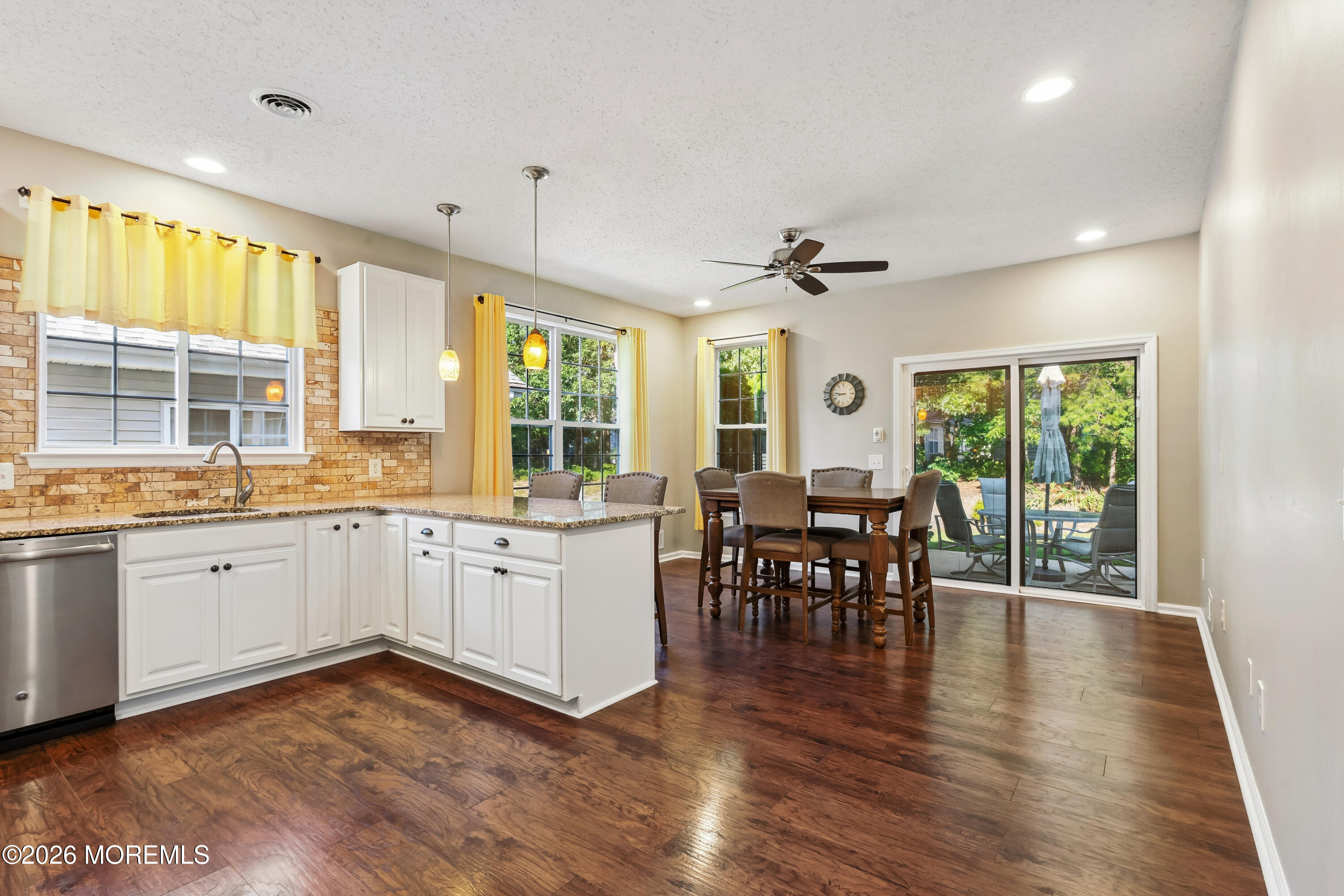 66 Sandpiper Road Barnegat, NJ 08005 - Photo 9 of 25 a very nice looking dining room with wooden floor and a window