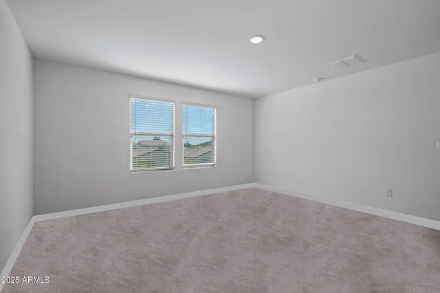 a view of a house with a snow in the yard