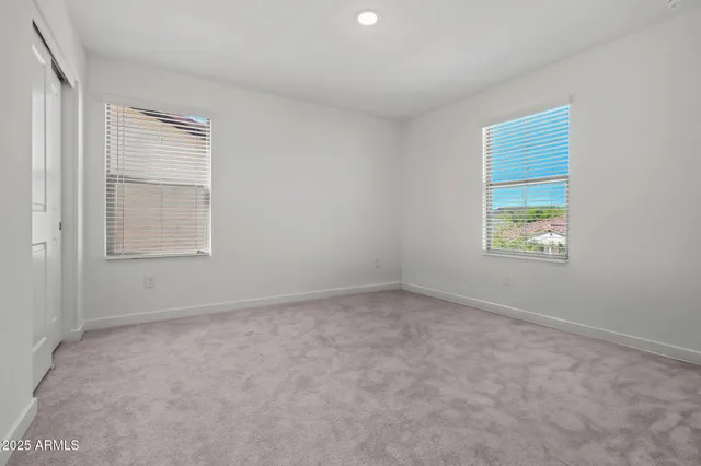 a room with a bed and a window