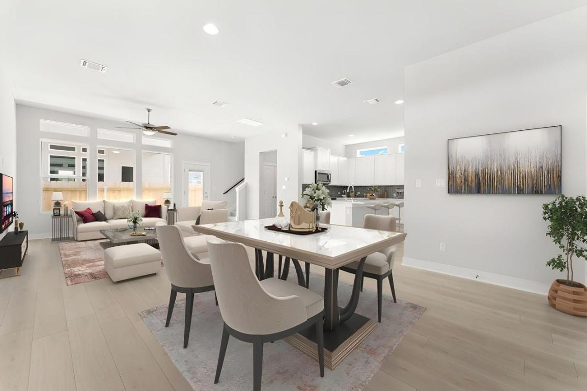 2200 Grenache Drive, Unit 105 Round Rock, TX 78664 - Photo 5 of 15 a view of a dining room with furniture