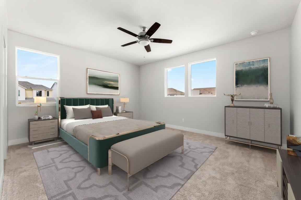 2200 Grenache Drive, Unit 105 Round Rock, TX 78664 - Photo 9 of 15 a bedroom with a bed and a television