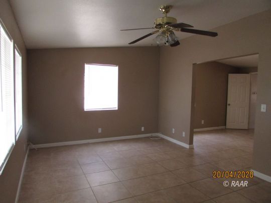304 North Florence Street Ridgecrest, CA 93555 - Photo 3 of 21 a view of an empty room with a window