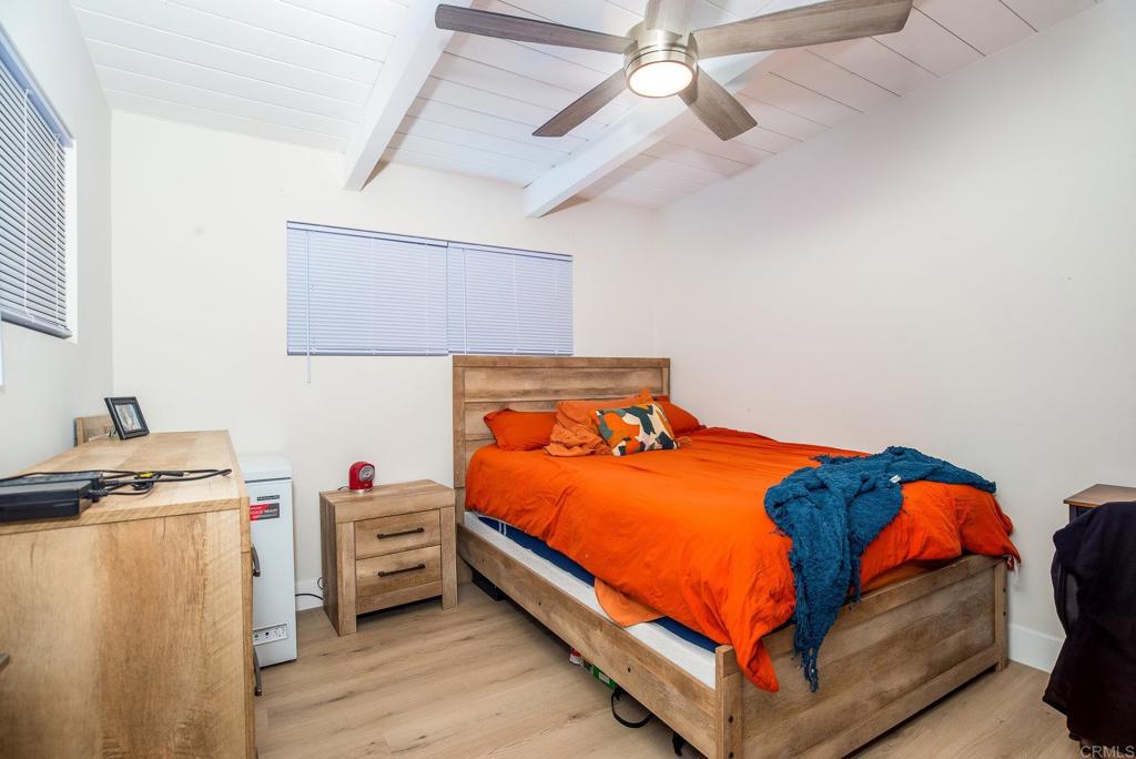 4776-78 Del Monte Avenue San Diego, CA 92107 - Photo 13 of 45 a bed room with a bed and a desk