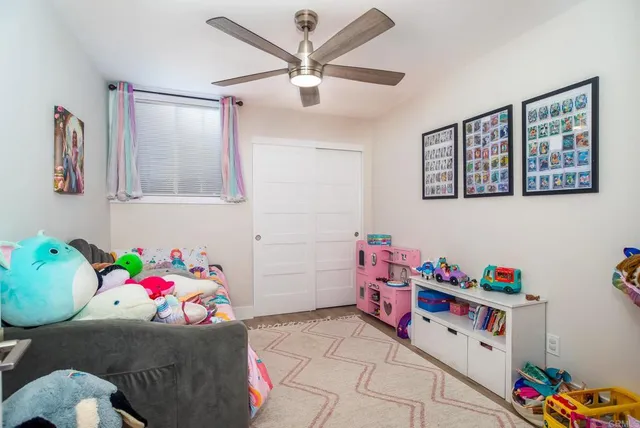 a bedroom with a bed and furniture