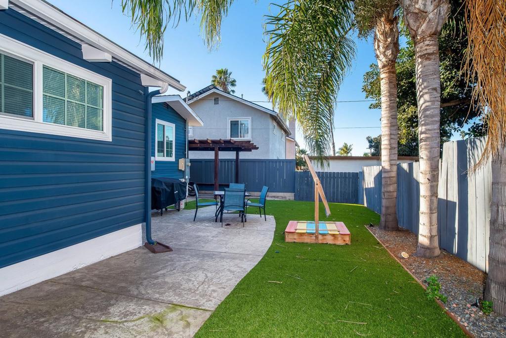 4776-78 Del Monte Avenue San Diego, CA 92107 - Photo 19 of 45 a view of a house with a yard and sitting area