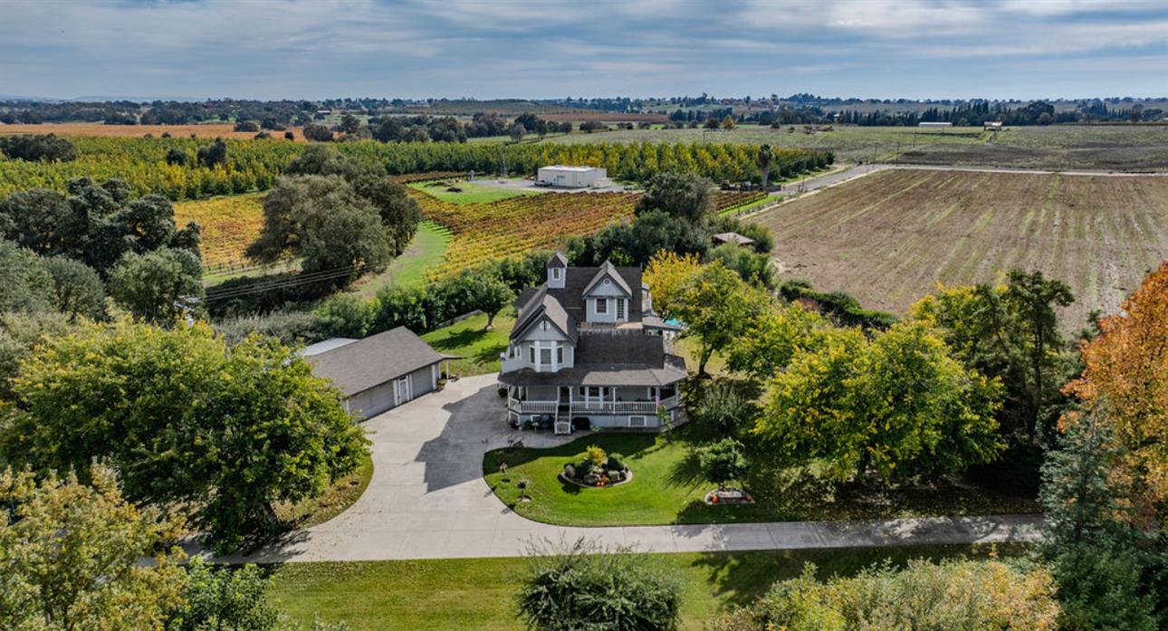 22140 North Clements Clements, CA 95227 - Photo 2 of 88 an aerial view of a house with a lake view