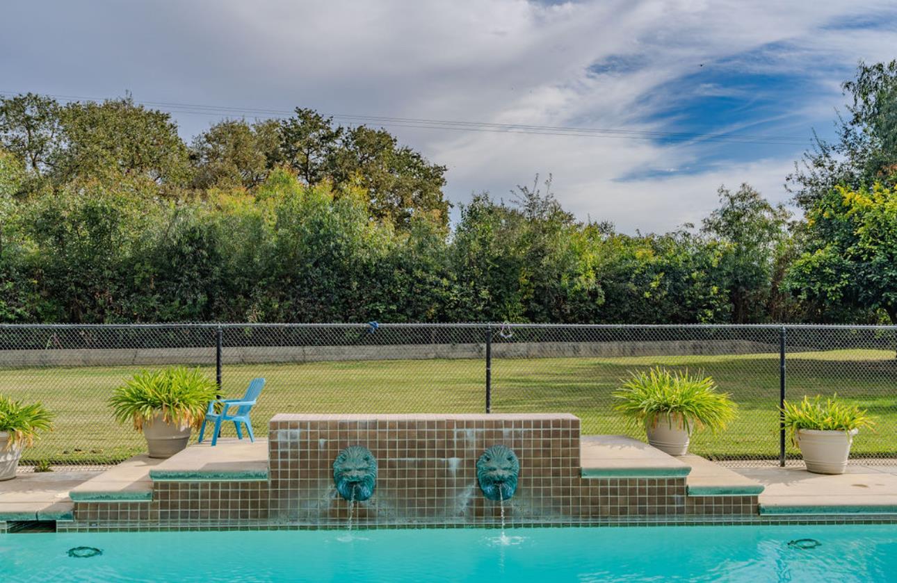 22140 North Clements Clements, CA 95227 - Photo 35 of 88 a view of a swimming pool with a patio
