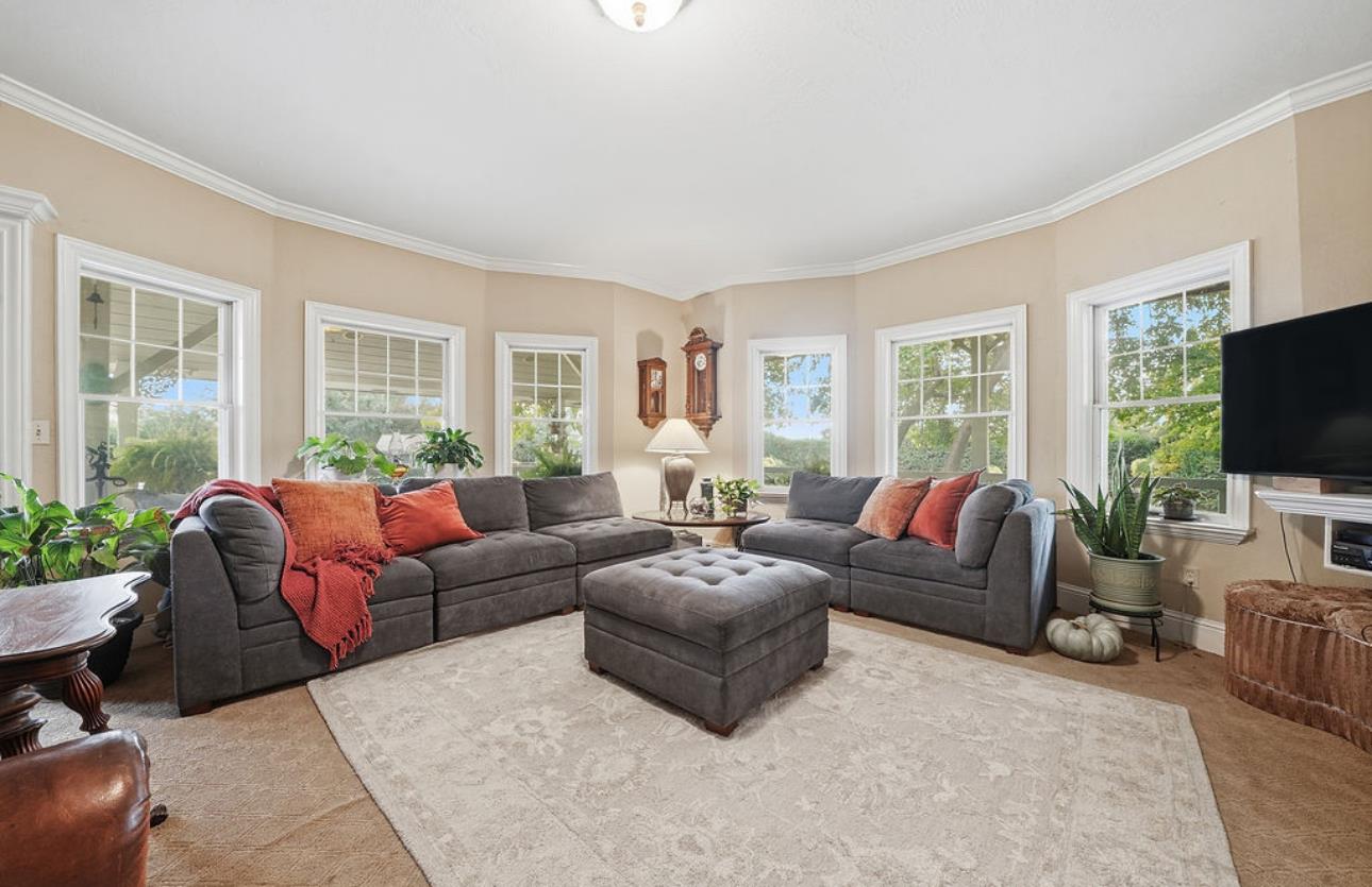 22140 North Clements Clements, CA 95227 - Photo 53 of 88 a living room with furniture and a flat screen tv
