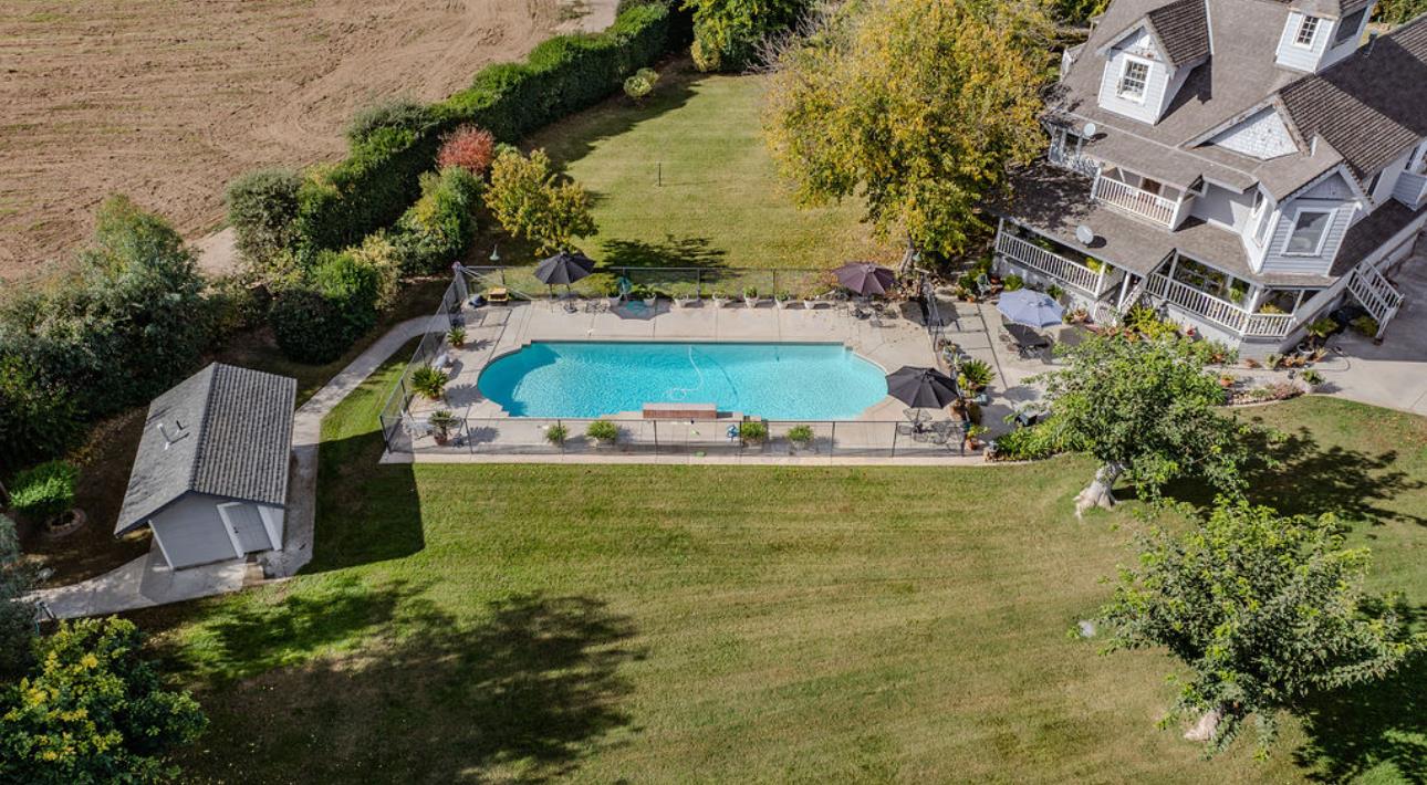 22140 North Clements Clements, CA 95227 - Photo 82 of 88 an aerial view of a house with a yard