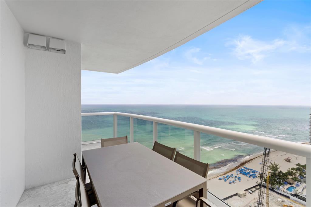 18911 Collins Avenue, Unit 3003 Sunny Isles Beach, FL 33160 - Photo 28 of 53 a view of a balcony with an outdoor space