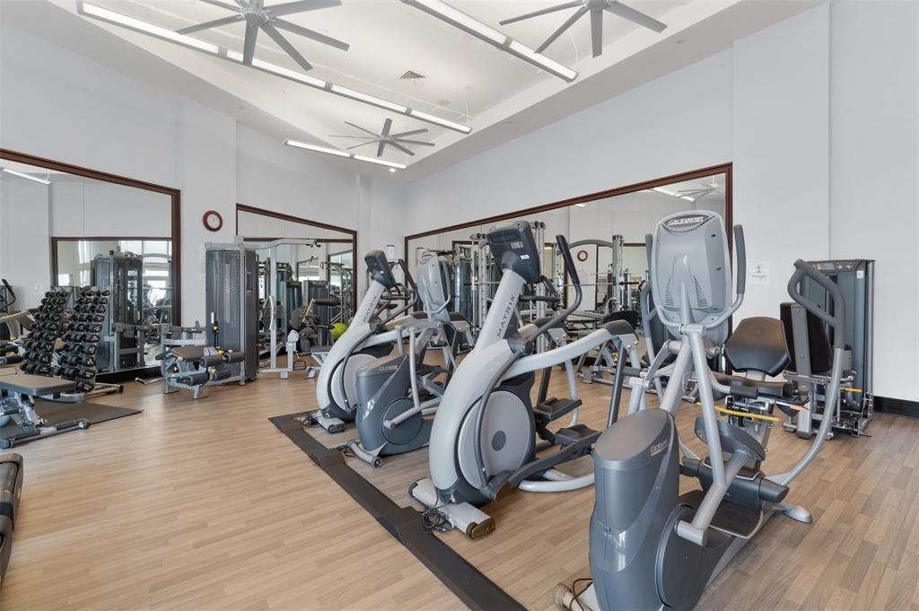 18911 Collins Avenue, Unit 3003 Sunny Isles Beach, FL 33160 - Photo 44 of 53 a view of a room with gym equipment