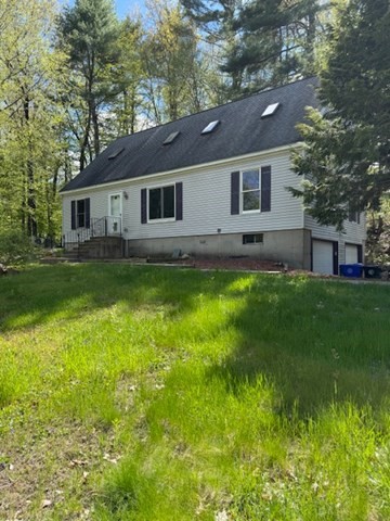 30 Groton Road Shirley, MA 01464 - Photo 1 of 25 a front view of a house with a yard