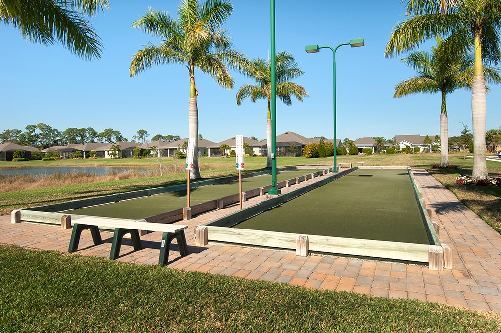 6187 Red Maple Manor Vero Beach, FL 32966 - Photo 30 of 31 a view of a swimming pool with chairs