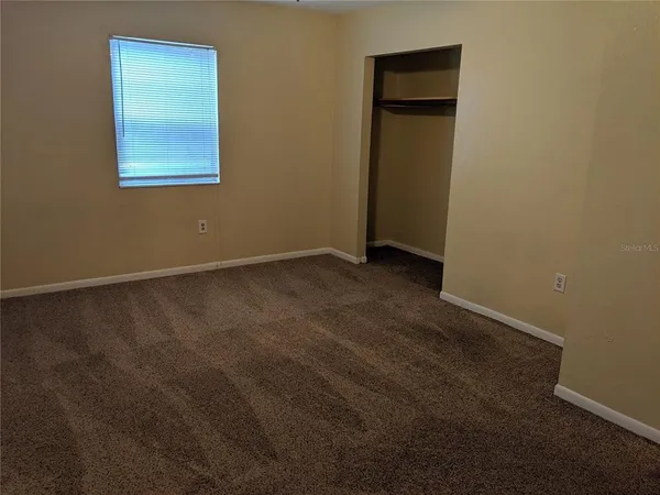 an empty room with a window